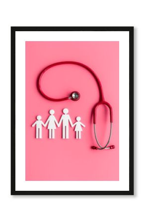 Wooden family figure with stethoscope. Life and health insurance concept