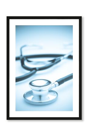 Medical Stethoscope on White background with Blue Toning