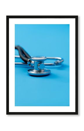 Close up of stethoscope on blue background