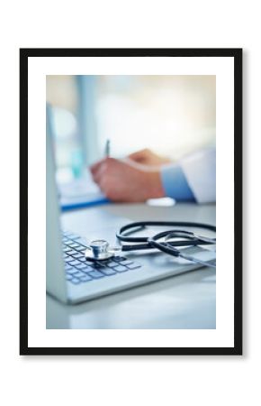 Computer, stethoscope and doctor hands writing on clipboard, healthcare information and research for insurance. Paperwork, documents and checklist of medical professional at desk on laptop and notes