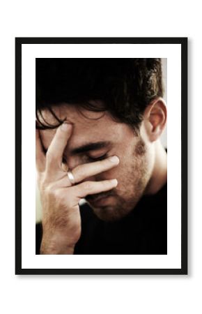 Man, sad or depressed with mental health and pain, stress or burnout with financial or life crisis, distress and upset. Emotion, hand covering face and trauma, bankruptcy or debt with depression