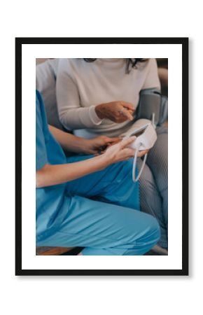 Asian doctor woman visited patient woman to diagnosis and check up health at home or private hospital. Female patient explain health problem and symptoms to doctor .Health care premium service at home
