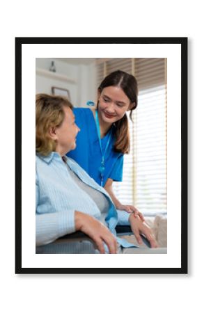 Caring Nurse Assisting Elderly Woman at Home - Compassionate Home Care Services for Seniors