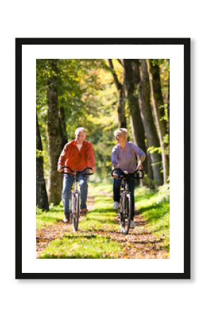 Seniors exercising with bicycle