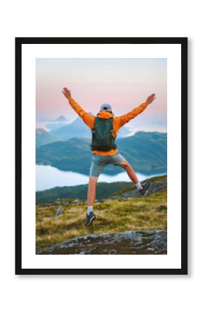 Man traveler happy jumping in mountains travel summer active vacations outdoor, tourist hiking healthy lifestyle freedom success concept mental health wellness eco tourism backpacking in Norway