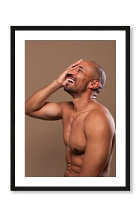 Beauty portrait of middle-aged hispanic black handsome man on colored background, concepts about beauty treatment, skincare and cosmetics for men