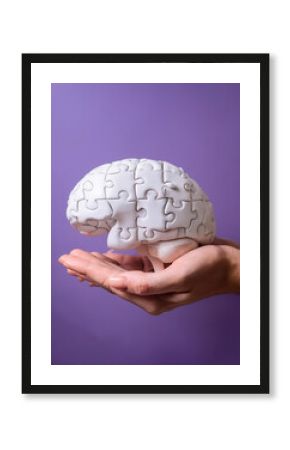 Human hands holding brain anatomy missing a piece of jigsaw puzzle on purple background. Concept of Memory loss, dementia, Alzheimer's disease, Parkinson's disease and mental health