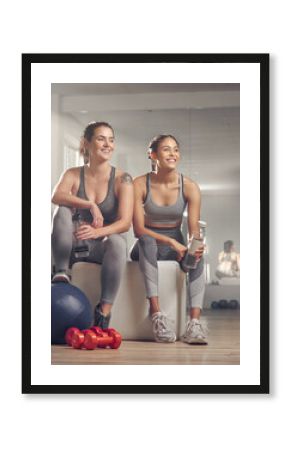 Water, gym and friends with exercise ball, personal trainer and break for women with wellness or liquid. Relax, instructor and fitness for people in health club, fluid and bottle for hydration
