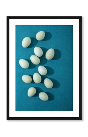 Blue eggs on blue  linen surface