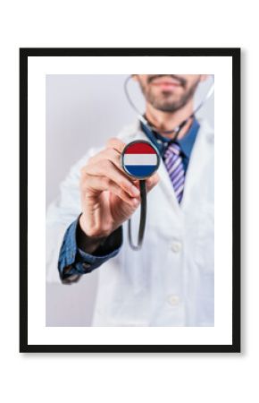 Netherlands health and medical insurance concept. Netherlands healthcare system, doctor holding stethoscope