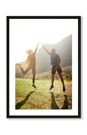 Success depends on your backbone, not your wishbone. Shot of a sporty couple high-fiving after a run.