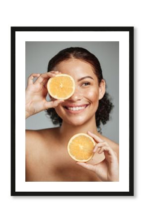 Woman, smile and orange in studio for skincare, health and wellness with cosmetic glow, self care and backdrop. Model, black woman and fruit for cosmetics, detox or healthy natural skin by background