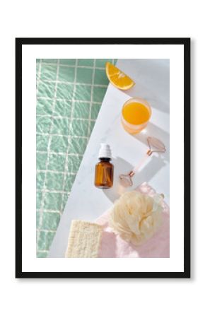 Cosmetic roller oil and citrus fruits with bath  accessories by pool