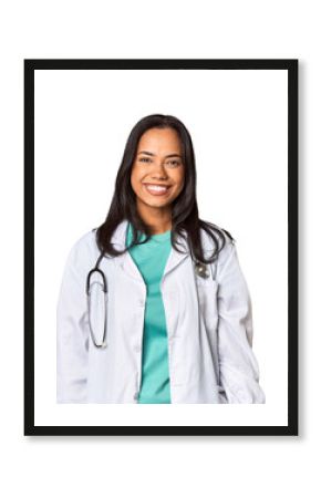 Young Filipina doctor with stethoscope in studio happy, smiling and cheerful.