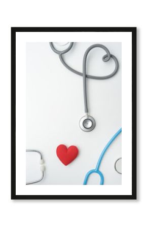 Red heart with stethoscope isolated on white background
