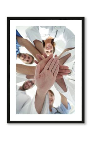 bottom view.a team of doctors at the medical center clasped their hands together