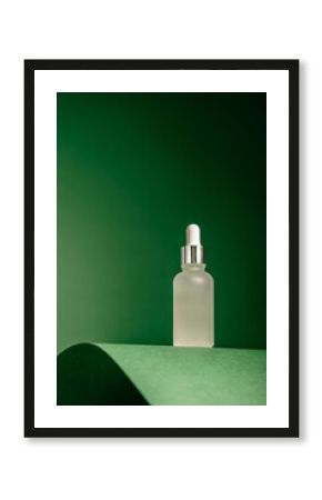 A frosted dropper bottle of facial serum stands against a green background, perfect for use in skincare branding, eco-packaging design, beauty ads, or wellness visuals.