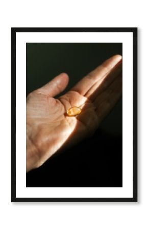 Vitamin Supplement in Hand