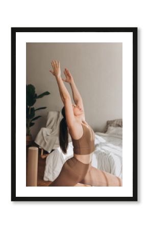 Woman Practicing Yoga Indoors for Healthy Lifestyle