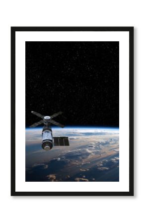 Cargo space craft and Earth planet. Dark background. Sci-fi wallpaper.Space Station Orbiting Earth.Space ship. Space art wallpaper.Solar Observatory.Elements of this image furnished by NASA.