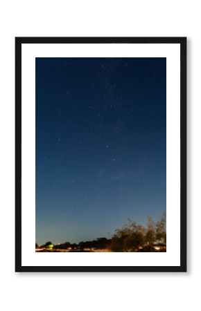 Starry night sky in light polluted urban area seen from NSW Australia
