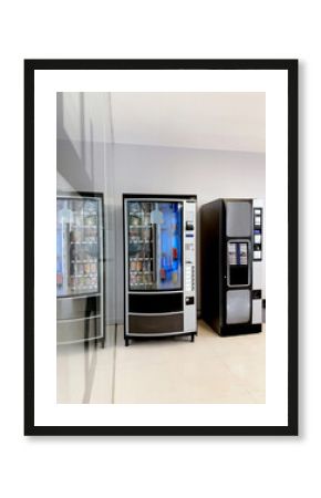 Modern vending machines with snack and drink options in a bright space