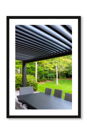 Pergola-covered outdoor dining. A sleek outdoor dining space features a spacious table and an inviting pergola surrounded by lush greenery.