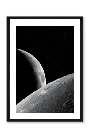 Close-up view of the moon and crescent moon in space