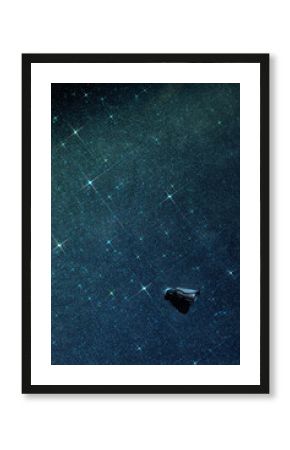 security camera against glitter space wall