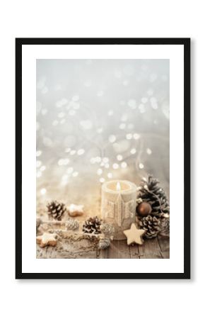 White Christmas candle on rustic wooden boards - Decoration with natural elements, twigs, pine cones and cookies - Advent background with copy space