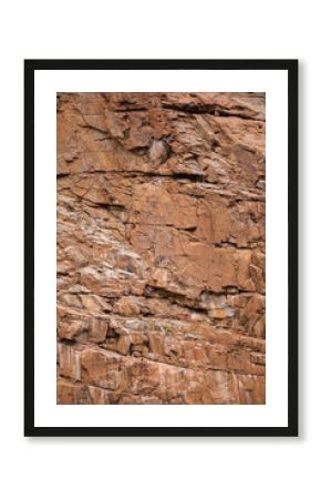 Lines and textures in rocks of mountain cliff