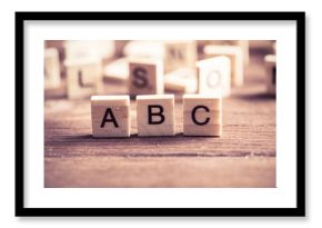 wooden elements with the letters collected in the word abc