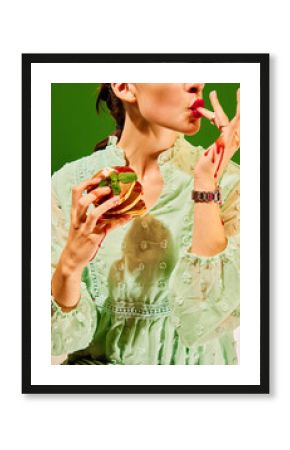 Breakfast. Food pop art photography. woman holding sweet pancakes, licking fingers in jam. Vintage, retro 80s, 70s style. Complementary colors.