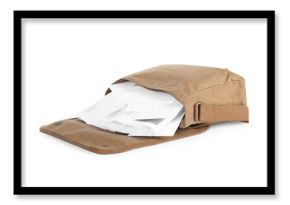 Brown postman bag with mails and newspapers on white background