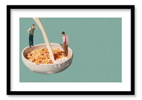 Men in vintage style clothing standing inside large bowl of cereal with milk pours against light teal background. Contemporary art collage. Food, pop art, surrealism concept. Creative colorful design.