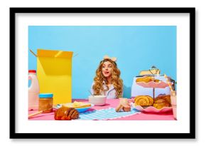 Food pop art photography. Image of cute woman want eating sweet breakfast, showing tongue out over light blue background