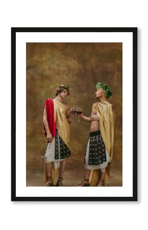 Two men in Roman costumes clinking wine glasses in cheerful ancient style toast. Concept of winery branding, restaurant poster design, festival visuals, and lifestyle celebration campaigns.