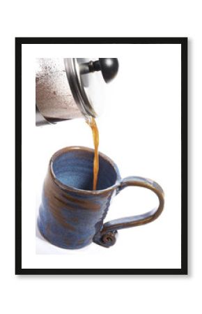 coffee poring in to a mug