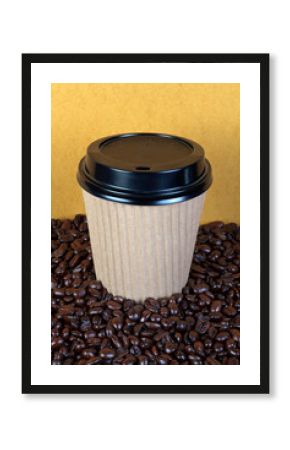 Disposable coffee cup and beans