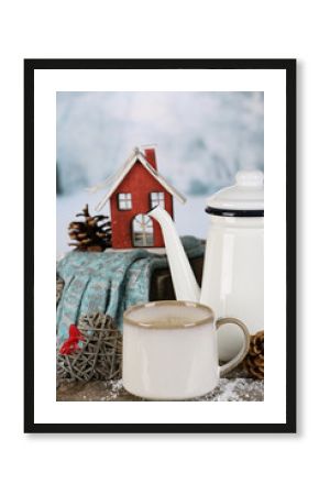 Winter composition with hot beverage on nature background