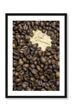 Map of Colombia under a background of coffee beans