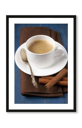 Cup of coffee with cinnamon