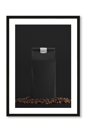 Black pack of coffee against black background