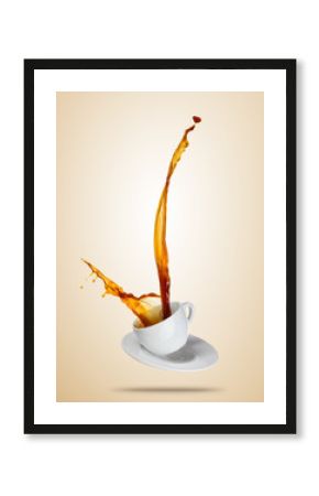 Porcelaine white cup with splashing coffee or tea liquid separated on brown background.