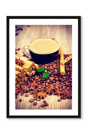 Cup of coffee on wooden background. Toned image