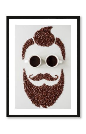 Bearded hipster man made of coffee beans with glasses made of cups of coffee