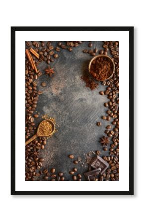 Ground coffee and coffee beans with spices .Top view with copy space.