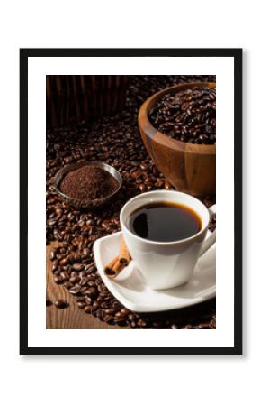 Cup of Black Coffee with Beans