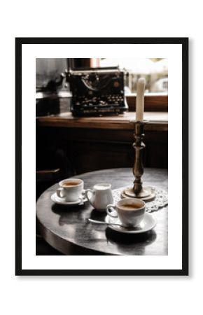 two coffee cups on table in cafe