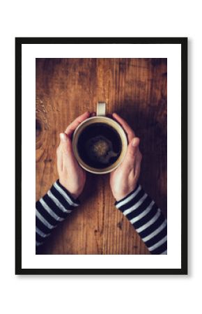 Lonely woman drinking coffee in the morning